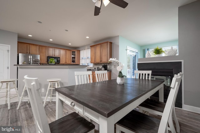 dining room with hardwood / wood-style floors