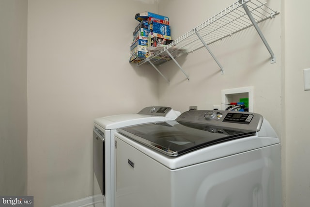 laundry area featuring washer and clothes dryer