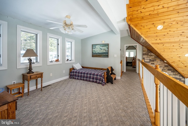 bedroom with vaulted ceiling with beams, light colored carpet, and ceiling fan