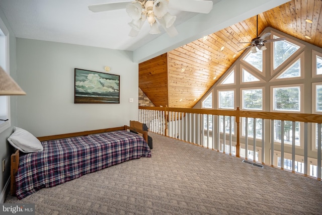 bedroom with vaulted ceiling, carpet, wood ceiling, and ceiling fan