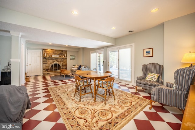 dining area featuring a fireplace