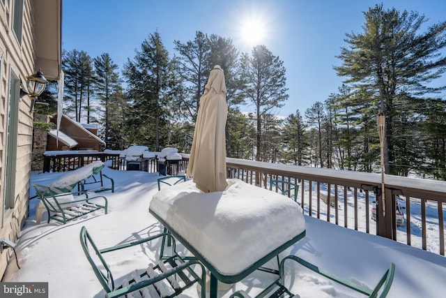 view of snow covered deck