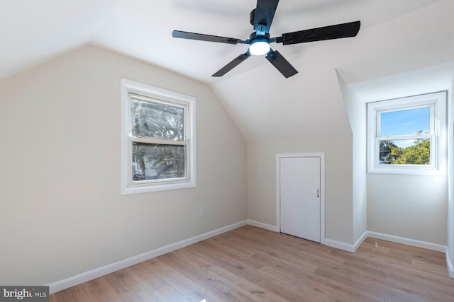 bonus room with ceiling fan, plenty of natural light, lofted ceiling, and light hardwood / wood-style floors