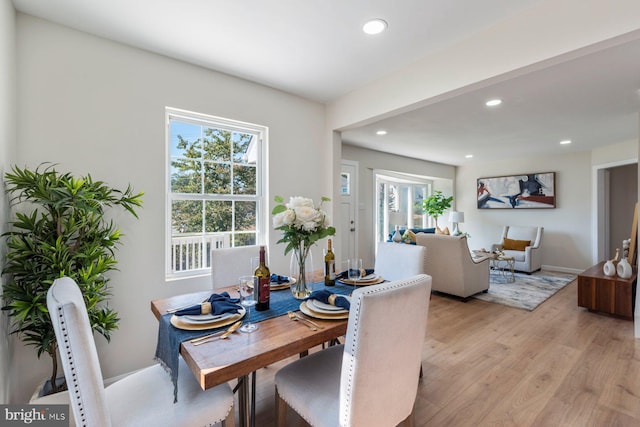 dining space featuring light hardwood / wood-style flooring