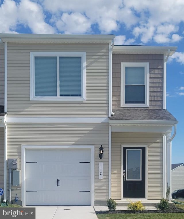 view of front of property featuring a garage