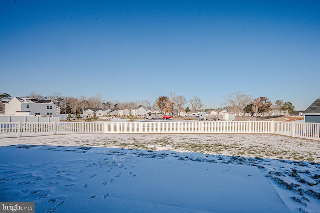 view of yard covered in snow