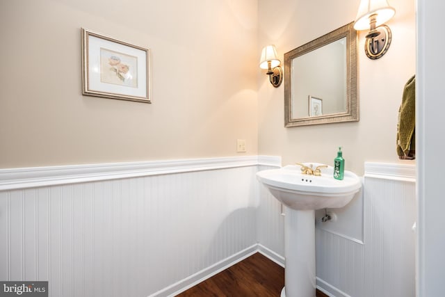 bathroom with sink and hardwood / wood-style floors