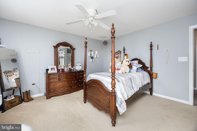 bedroom with light colored carpet and ceiling fan