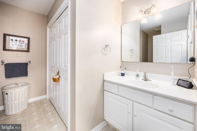 bathroom with vanity and tile patterned floors