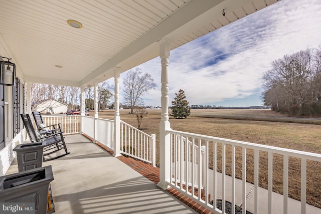 exterior space featuring a rural view and a porch