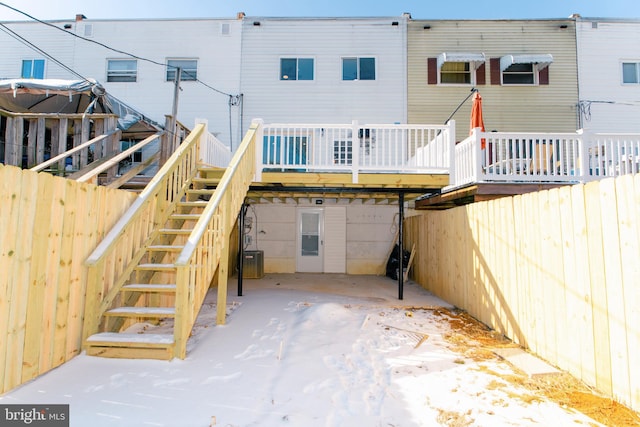 rear view of property with a deck