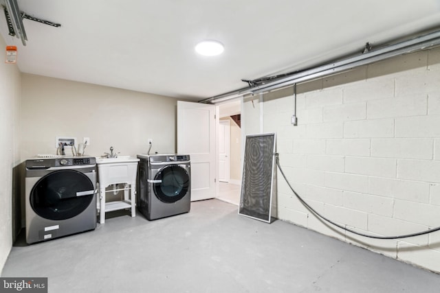 laundry area with washer and dryer