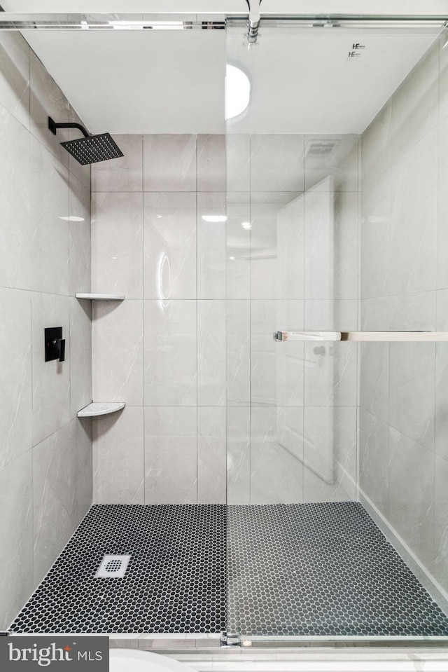 bathroom featuring walk in shower