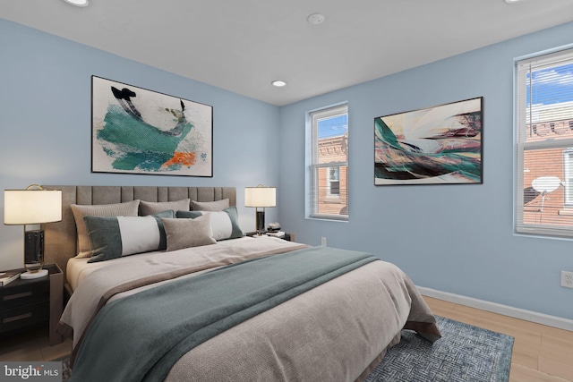 bedroom featuring light wood-type flooring