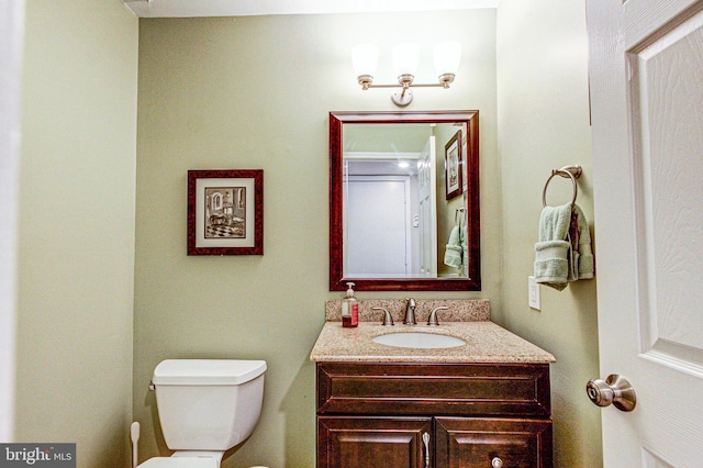 half bath with toilet and vanity