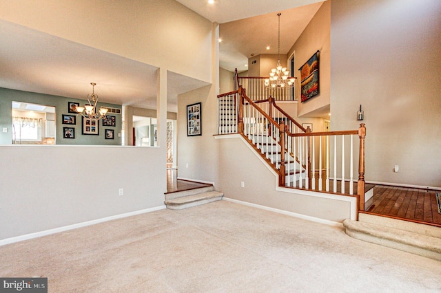 interior space with recessed lighting, baseboards, carpet, and an inviting chandelier