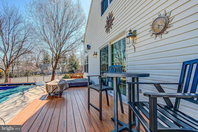 wooden deck featuring fence