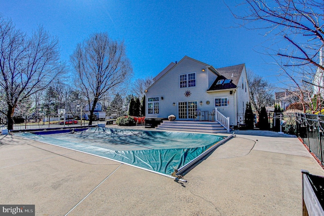 view of pool featuring a patio, fence, and a fenced in pool