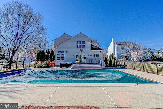 view of pool with a patio area, fence, and a fenced in pool