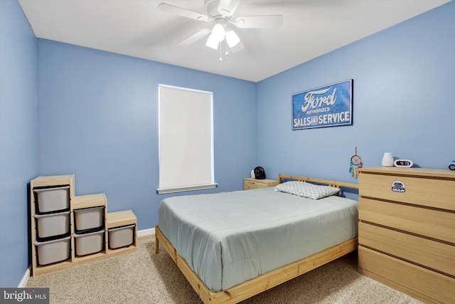 bedroom with ceiling fan and carpet flooring