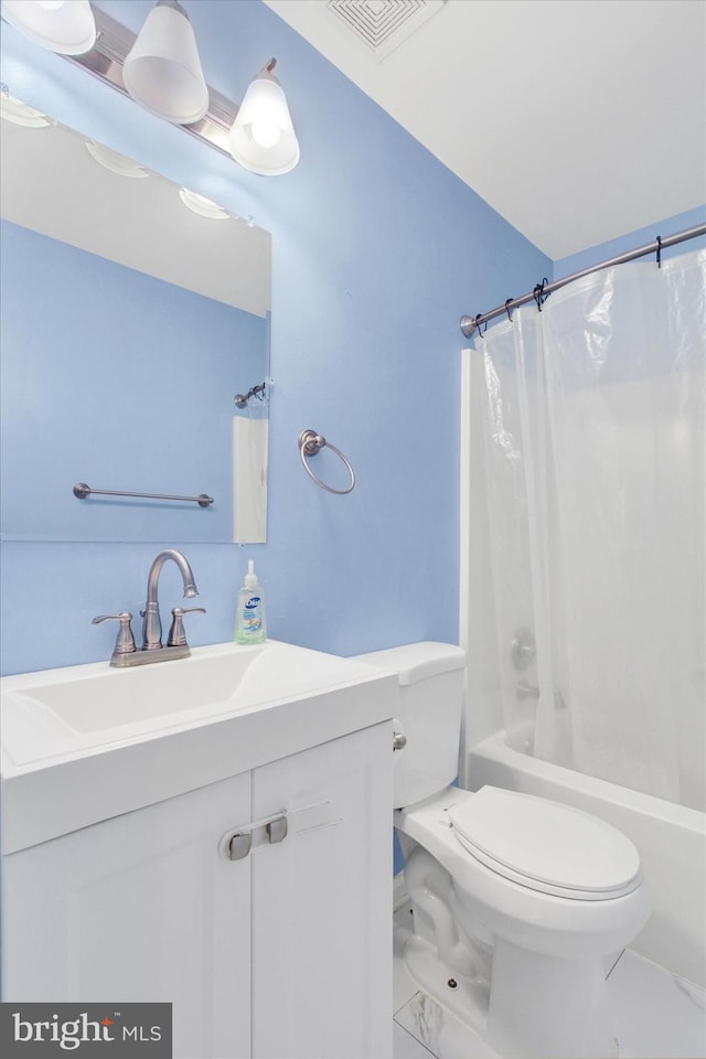 full bathroom featuring shower / bathtub combination with curtain, vanity, and toilet