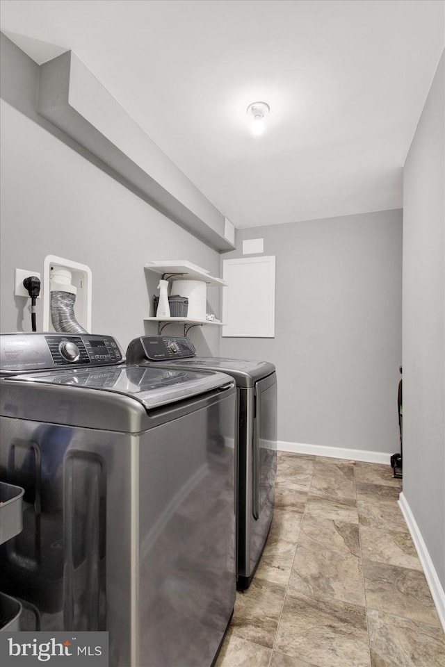 laundry room with washer and clothes dryer