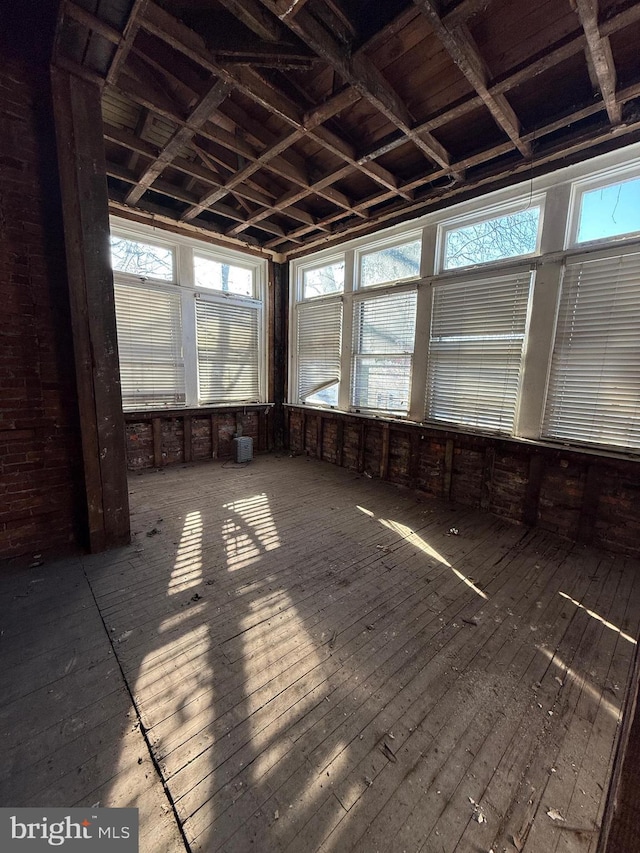 miscellaneous room featuring wood-type flooring