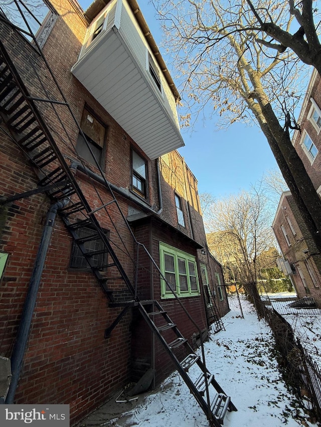 view of snow covered property