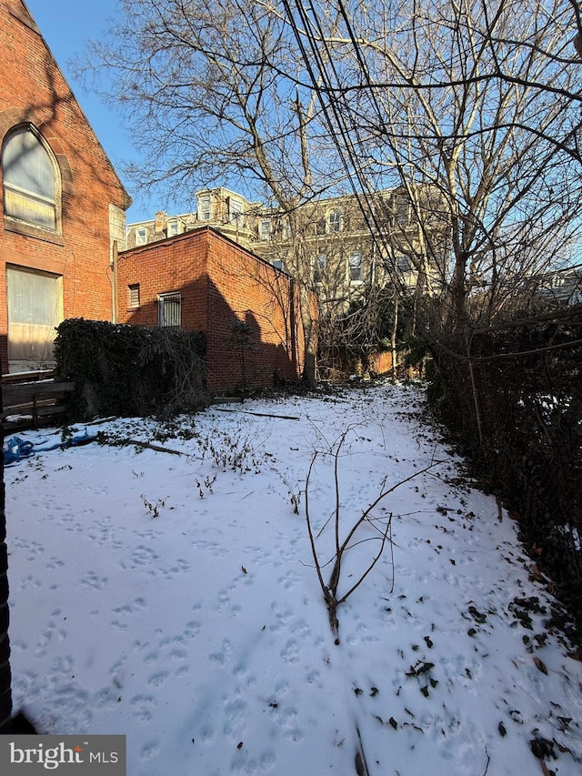 view of snowy yard