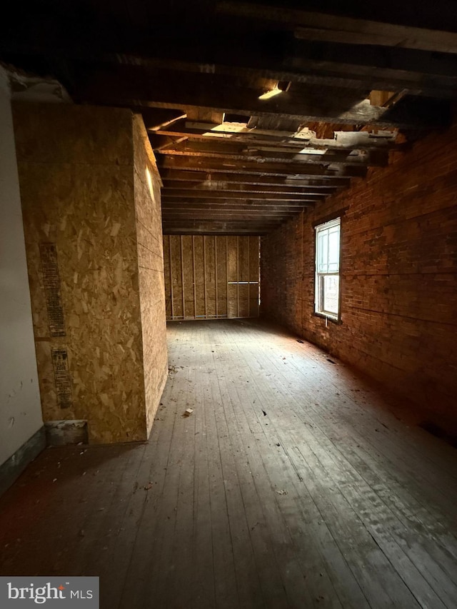 miscellaneous room with hardwood / wood-style floors