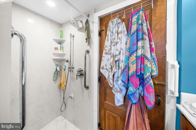 bathroom with vanity and walk in shower