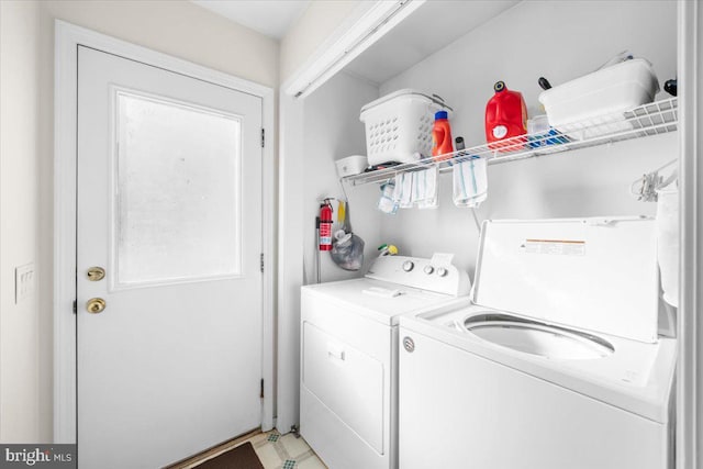 laundry room featuring separate washer and dryer