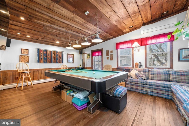 playroom with baseboard heating, hardwood / wood-style flooring, a wall unit AC, and wooden ceiling