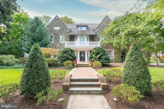 tudor house with a balcony