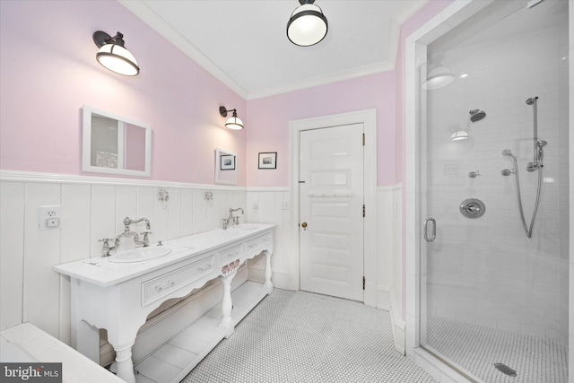 bathroom featuring ornamental molding, vanity, tile patterned floors, and a shower with shower door