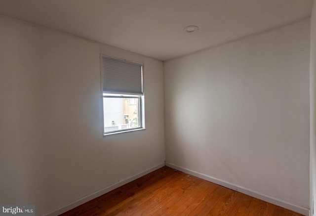 spare room with light hardwood / wood-style floors