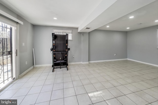 basement with light tile patterned floors