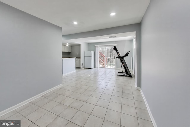 interior space featuring light tile patterned floors