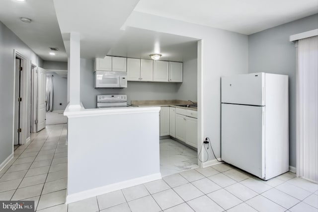 kitchen with white cabinetry, white appliances, and sink