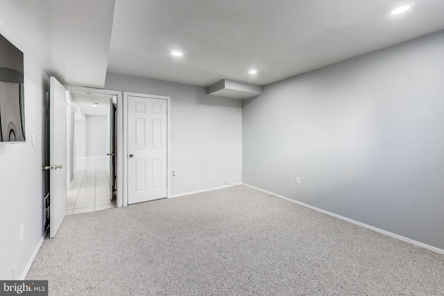 interior space featuring light colored carpet