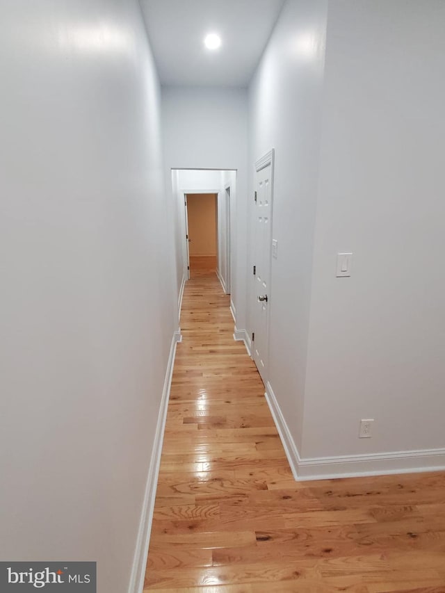 hall featuring light hardwood / wood-style flooring