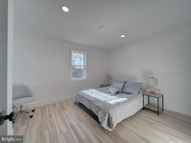 bedroom with light hardwood / wood-style flooring