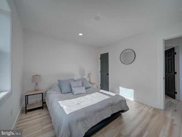 bedroom featuring light wood-type flooring