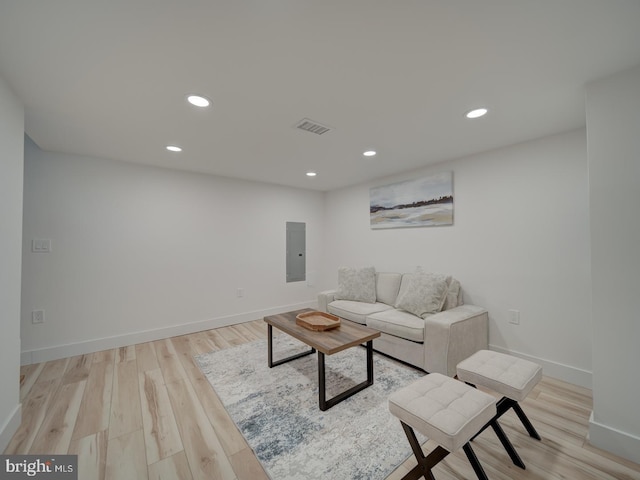 living room with light hardwood / wood-style floors