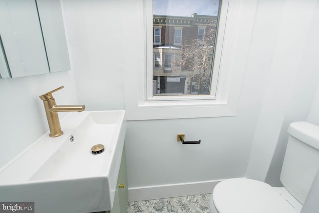 bathroom with sink and toilet