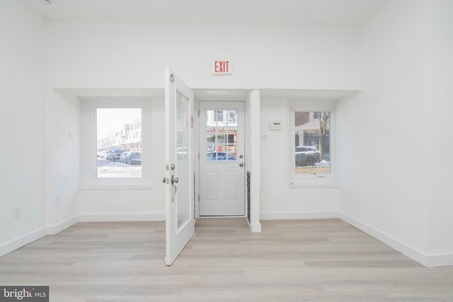 entrance foyer with light wood-type flooring