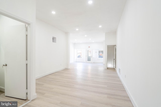 corridor featuring light hardwood / wood-style flooring