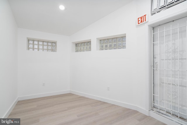 spare room featuring light wood-type flooring