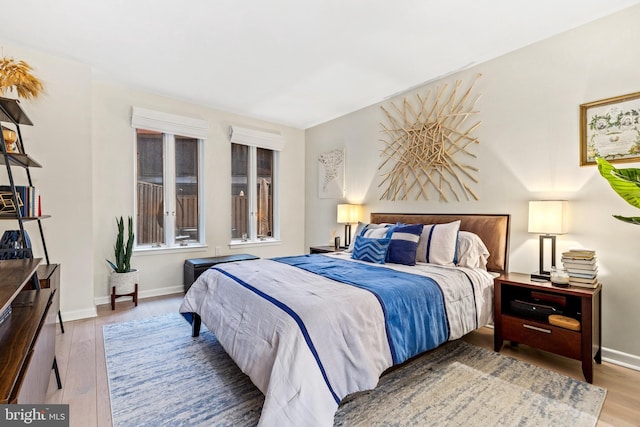 bedroom with hardwood / wood-style flooring