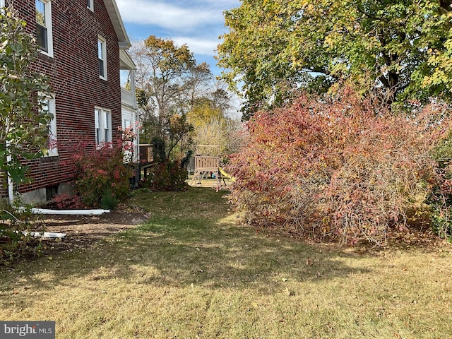 view of yard with a playground